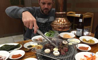 image of man at korean barbeque