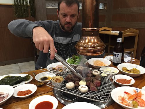 image of man at korean barbeque