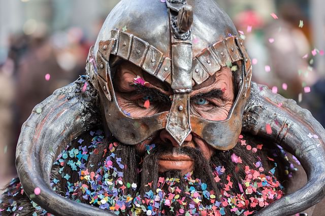 Man in traditional armour with confetti in his beard