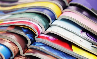 Magazines stacked on top of one another